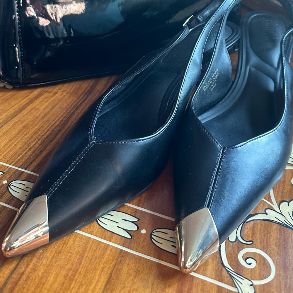 Elegant Black and Silver Pointed Toe Heels